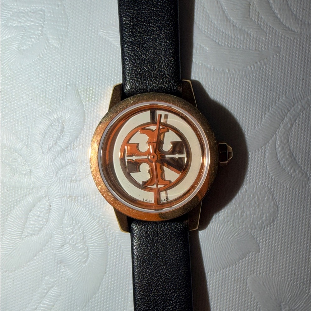 Tory Burch Black and Gold Women's Watch
Swiss made